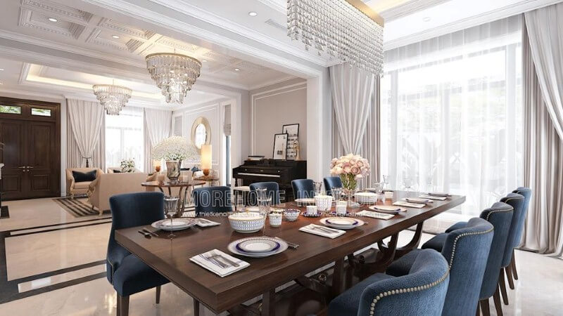 Bố trí phòng ăn liền phòng khách đẹp, sang trọng ấn tượng với sắc xanh nổi bật từ bộ bàn ghế cùng lối thiết kế nội thất tân cổ điển quý phái. Thiết kế nội thất