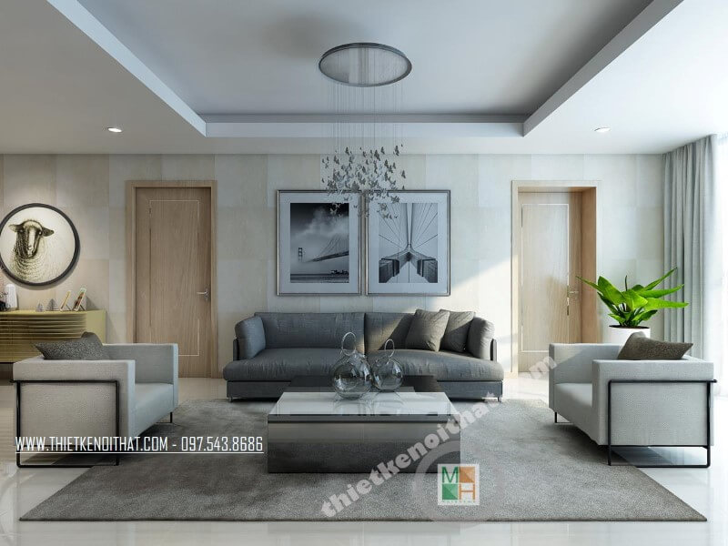 Mẫu thiết kế phòng khách chung cư hiện đại với bộ sofa bọc vài màu xám và trắng tạo điểm nhấn nổi bật cho căn phòng. Thiết kế nội thất