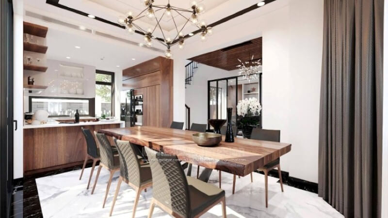 Sẽ là một gợi ý sáng tạo sẽ khiến bạn thích thú như trong ý tưởng thiết kế không gian bếp hiện đại biệt thự Vinhomes Imperia Hải Phòng trong đây, bố trí kệ trang trí ở vị trí gần bàn ăn nhất giúp bạn lấy ly, chén một cách thuận tiện. Thiết kế nội thất