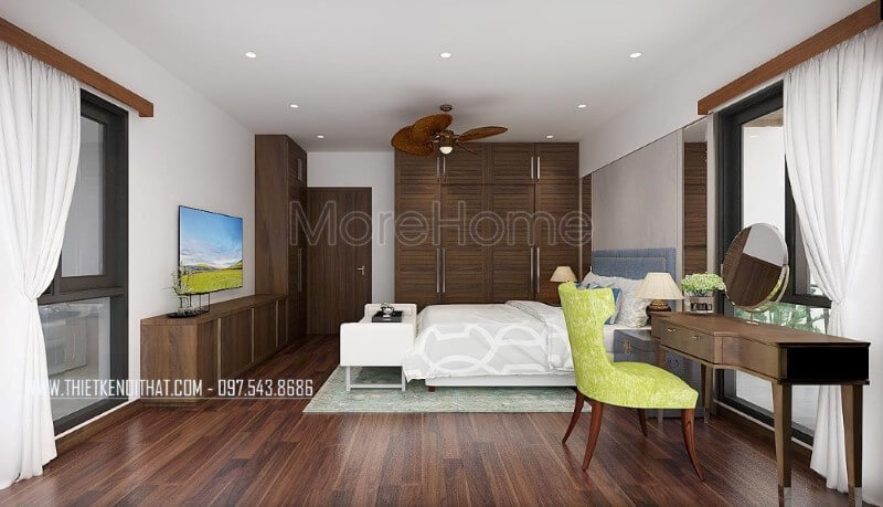 Sàn gỗ, bộ bàn ghế trang điểm, tủ quần áo, kệ tivi, cửa gỗ gỗ óc chó đã tạo nên vẻ đẹp sang trọng, độc đáo trong phong cách hiện đại tại phòng ngủ vợ chồng mặc dù với phong cách này đồ nội thất gỗ công nghiệp thường là lựa chọn phổ biến. Thiết kế nội thất