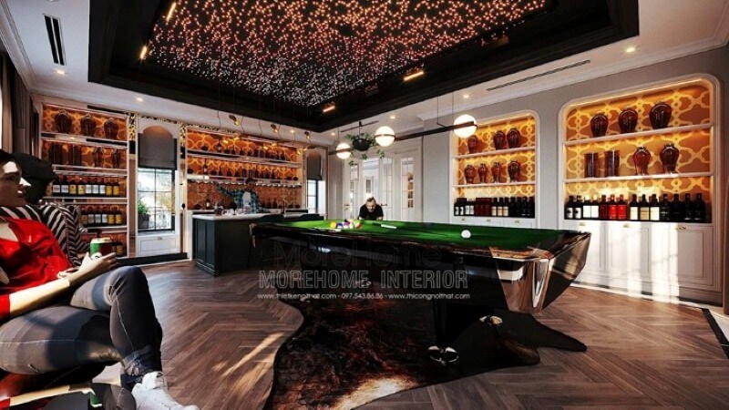 Bàn bi-a, quầy bar, hầm rượu, trần xuyên sáng đã tạo nên nét đẹp sang trọng, đẳng cấp trong sắp xếp nội thất phòng giải trí tại biệt thự. Thiết kế nội thất